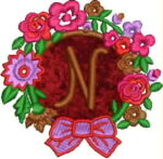 Elegant machine embroidery design featuring a large script letter "N" centered in a vibrant floral wreath of pink, purple, and red roses with green leaves, accented by a purple bow at the bottom.