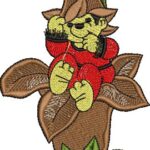 Cute machine embroidery design of a cheerful baby elf or pixie in red pajamas sitting inside a brown flower pod with large petals, wearing a matching flower hat, and surrounded by green leaves and stem.