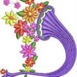 Whimsical machine embroidery design of a large purple gramophone horn overflowing with a colorful burst of flowers in red, orange, yellow, magenta, and pink, with green stems and leaves.