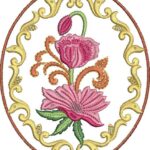 Ornate machine embroidery design in an oval frame with intricate gold swirls and brown outline, featuring a central pink lotus-like flower with layered petals, an upward pink bud, orange curling stems, and green leaves.